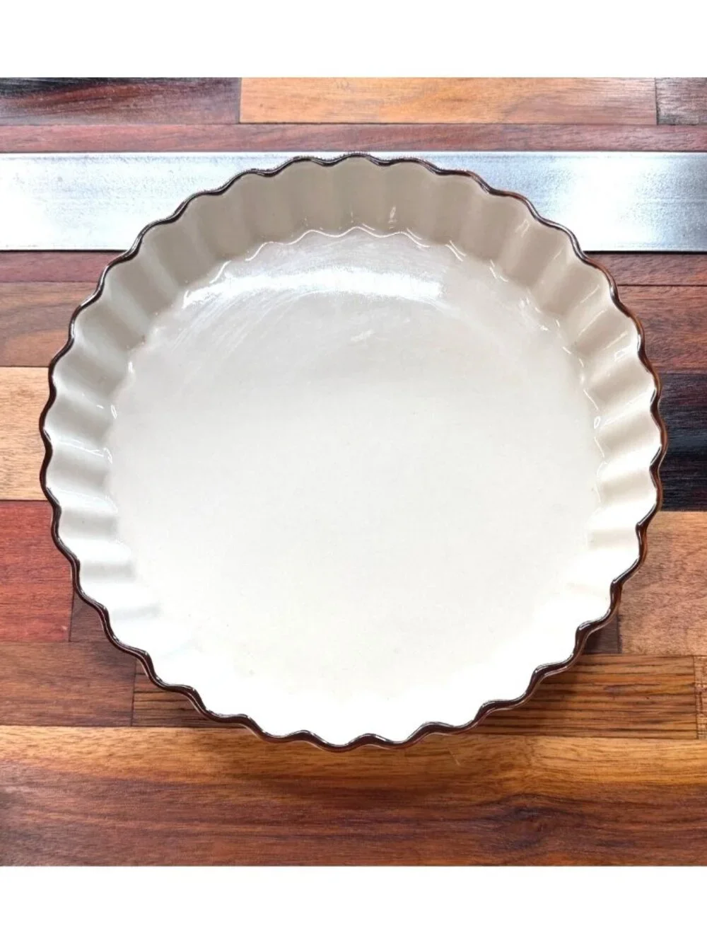 Vintage fluted stoneware pie plate or quiche dish produced under the Catalinasto